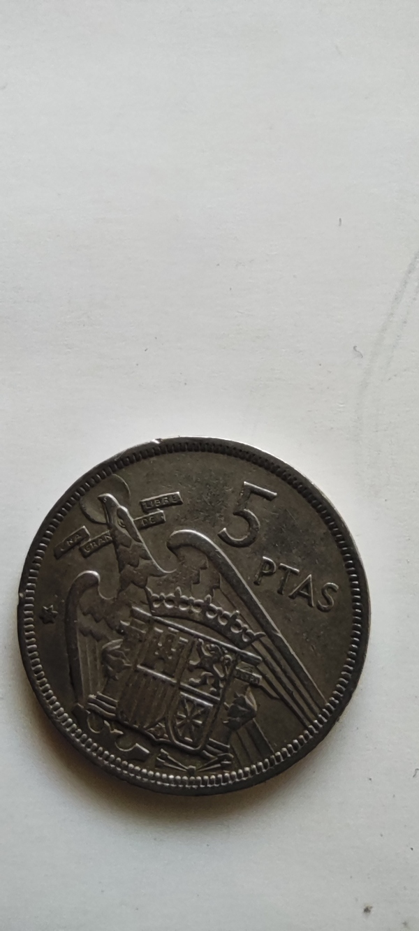 5 pesetas 1957 y estrella 73
