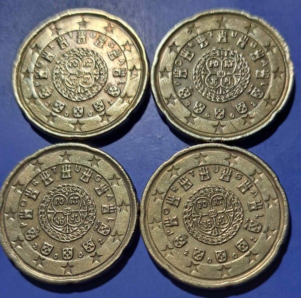 04☆☆ Vendo lote de 4 monedas de 20 céntimos de euro ( higienizadas ) de Portugal del año 2002.