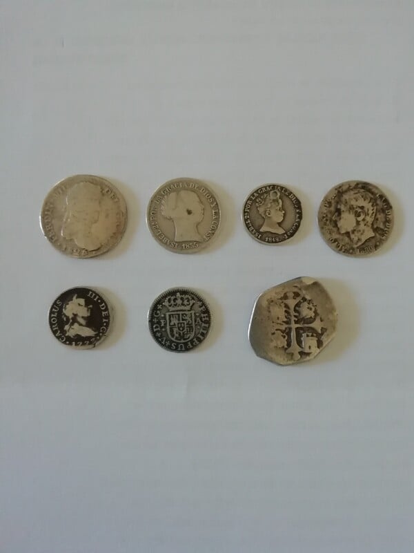 Conjunto de monedas de plata.