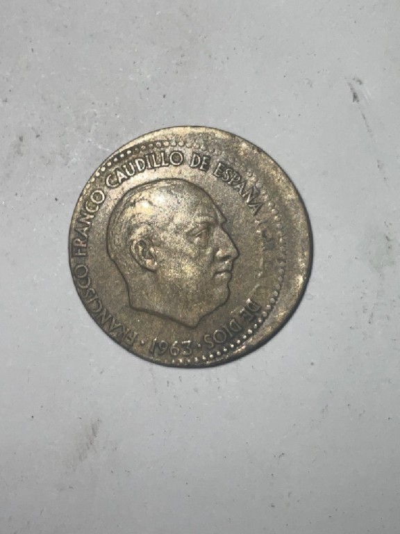 Foto 1 Moeda não identificada: 1 peseta 1963 error ?