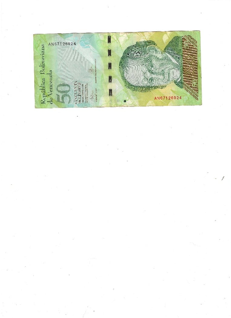 Foto 1 Moeda não identificada: 50 bolivares cuanto seria su valoracion?