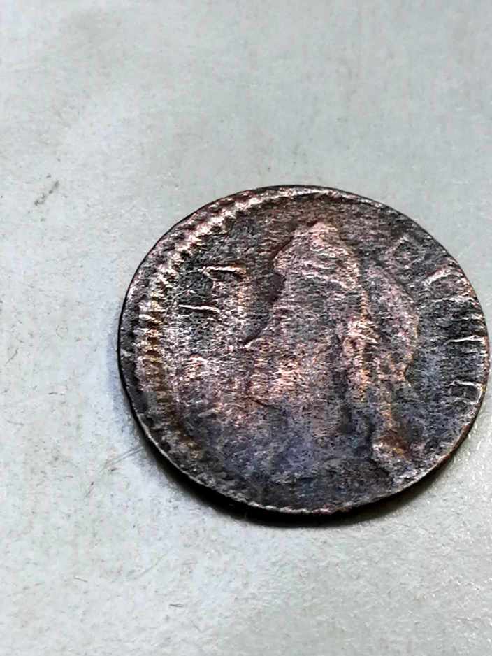 Foto 1 Moeda não identificada: Me pueden ayudar a identificar está moneda?