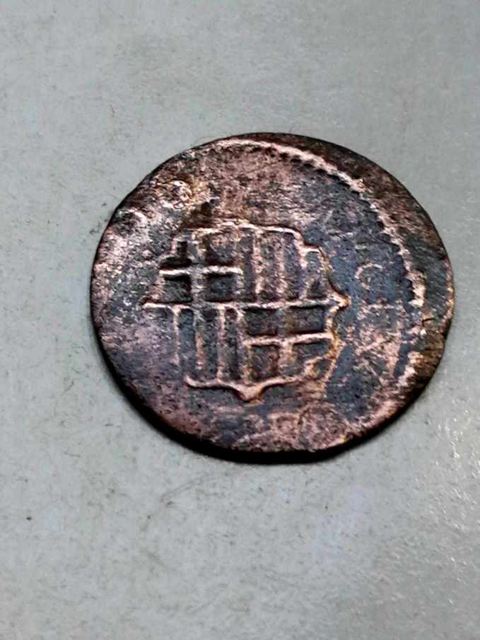 Foto 2 Moeda não identificada: Me pueden ayudar a identificar está moneda?